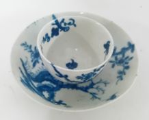 An 18th century miniature tea bowl and saucer, possibly First Period Worcester, cherry blossom