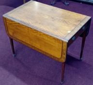 A 19th century satinwood Pembroke table, cross banded with inlay flower decoration on square tapered