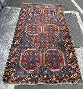 A patterned rug 240cm x 135cm.