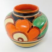 A Clarice Cliff miniature vase in 'Bizarre Floret' pattern, 'Newport Pottery England' mark to
