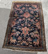 A patterned rug 157cm x 100cm.