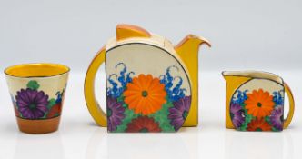 A Clarice Cliff 'Gayday' pattern tea service, to include teapot, milk jug, and sugar bowl, 'Gay