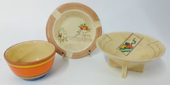 Two Clarice Cliff bowls, together with an ashtray. (3)