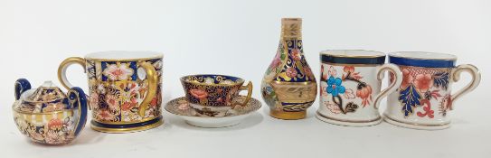 A Royal Crown Derby Imari pattern miniature 2451 pattern three handled cup, 4cm high, printed