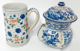 An 18th century Bristol Delft tankard, polychrome floral decoration, height approx 17cm, together