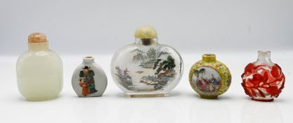 A group of snuff bottles, comprising; a glass overlay snuff bottle, possibly 19th century, 6.2cm; (