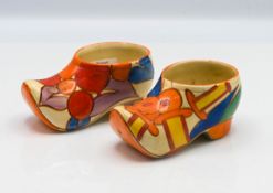 A Clarice Cliff 'Berries' pattern clog or sabot, together with another, Fantasque mark to base. (2)