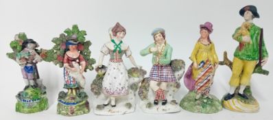 A collection of porcelain figurines, to include two bocage figures, a Scottish pair 'Flora' and '
