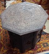 An oak towel rail, carved Indian folding occasional table and a picture easel. (3).