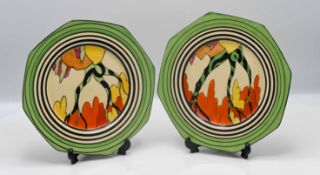 A Clarice Cliff pair of plates in 'Honolulu' pattern. (2)