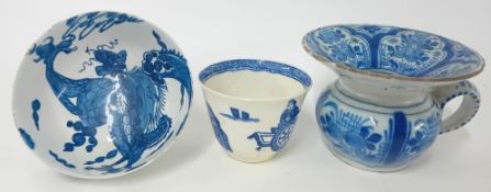 A tin-glazed earthenware shaving mug, of painted blue design, together with an 18th century
