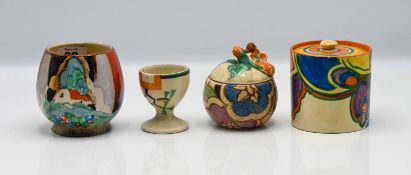 A Clarice Cliff 'Gardenia' preserve pot, together with a 'Ravel' pattern egg cup, a 'Secrets'