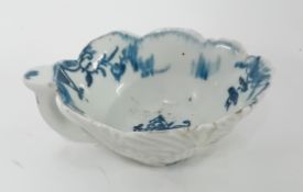 An 18th century porcelain cream boat in the form of leaves, possibly First Period Worcester, with