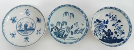 Three 18th century porcelain saucers, possibly First Period Worcester, one with crescent or 'C' mark
