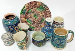 A collection of European hand painted earthenware folk pottery, to include teacups, mugs, vases,