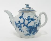 An 18th century porcelain teapot of globular shape, possibly First Period Worcester, with cherry