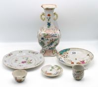 A ‘famille-verte’ vase, Kangxi (1662-1722), of lobed quatrefoil section, the ovoid body on a tall