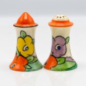 A Clarice Cliff 'Muffineer' shape salt and pepper set, floral pattern. (2)