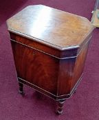 A Georgian mahogany wine cellarette, lead lined with 6 divisions on ring turned legs and brass