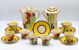A Clarice Cliff flowers and squares pattern collection to include a coffee pot, and another in '