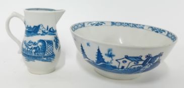 An 18th century porcelain bowl, probably lowestoft, willow tree and house motif to