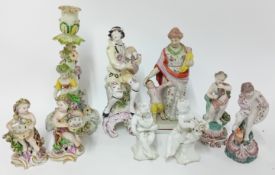 A collection of 18th and 19th century porcelain figures, to include bocage pieces, candlestick, etc.