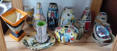 A collection of various abstract pottery, to include vases, plate, owl money box, etc.