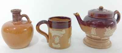 A Royal Doulton miniature mug, jug, and teapot, in brown and tan glaze, inscribed to bases 'Royal