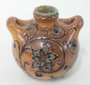 A Martin Brothers miniature twin handled stoneware vase by Edwin & Walter Martin, dated 1902,