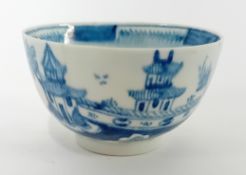 An 18th century tea bowl, bears sticker to the base attributing it to Lowestoft Pottery, decorated