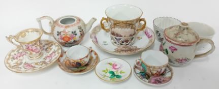 A 19th century Berlin porcelain twin handled chocolate cup and stand, blue marks to base, together