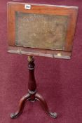 A 19th century mahogany tripod music stand.