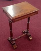 A 19th century mahogany sewing table, with hinged top over a fitted interior.
