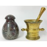 A brass pestle and mortar and a Cornish serpentine door stop.