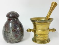 A brass pestle and mortar and a Cornish serpentine door stop.