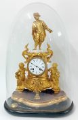 A 19th century French ornate gilt mantle clock, with stand and glass dome, height overall approx