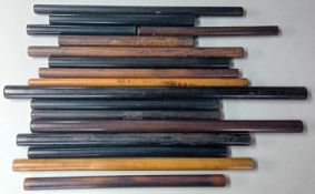 A quantity of antique rulers.