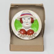 Designed by Beryl Cook O.B.E. (British, 1926-2008) a circular ceramic plaque 'Bowls', diameter 14.