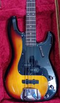 A Squire Precision Bass by Fender, Sunburst, S/N ICS 13098655, cased.