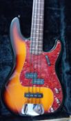 A Fender Precision Bass, Sunburst, S/N MZ 0165433, cased.