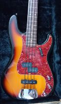 A Fender Precision Bass, Sunburst, S/N MZ 0165433, cased.