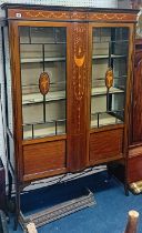 An Edwardian mahogany inlaid two door display cabinet.