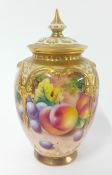 Royal Worcester porcelain jar and cover decorated with fruits, signed (damage to lid and body),