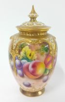 Royal Worcester porcelain jar and cover decorated with fruits, signed (damage to lid and body),