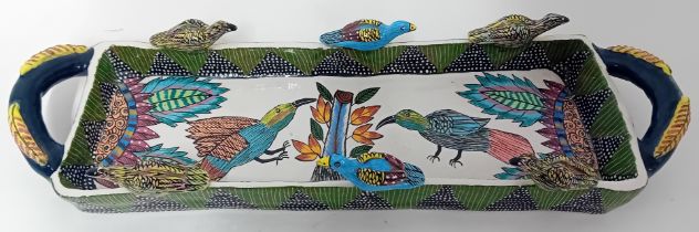 An Ardmore Studio Pottery dish by Bong, 1995, decorated with handles and birds to rim, signed to