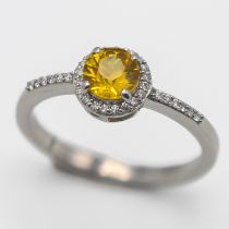 A diamond and yellow sapphire dress ring, set in platinum, size S/T, approx 5.1g, marked inside