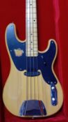 A Squire Tele Neck Precision Bass by Fender, Natural, S/N CGS 1111376, cased.