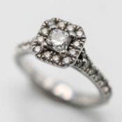 A diamond 'Square' shape cluster ring, set with further diamonds to the shoulders, approx 0.32ct,
