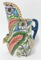 An Ardmore Studio Pottery jug by Goodness, signed to base and dated 1994, height 24cm.