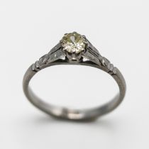 A single diamond solitaire ring, set in platinum, size M, total weight approx 2.9g.